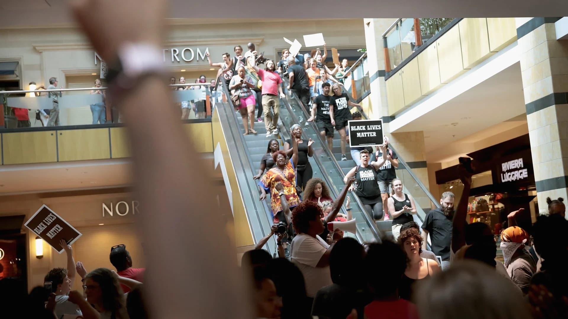 St. Louis protesters go to upscale malls, suburb