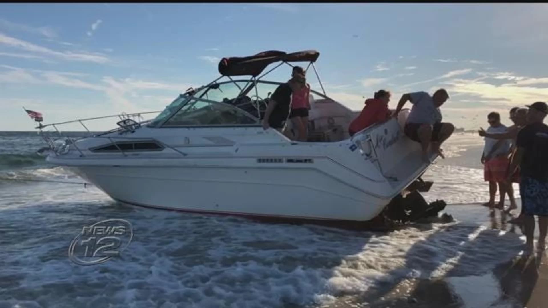 Boat washes ashore in Lido Beach