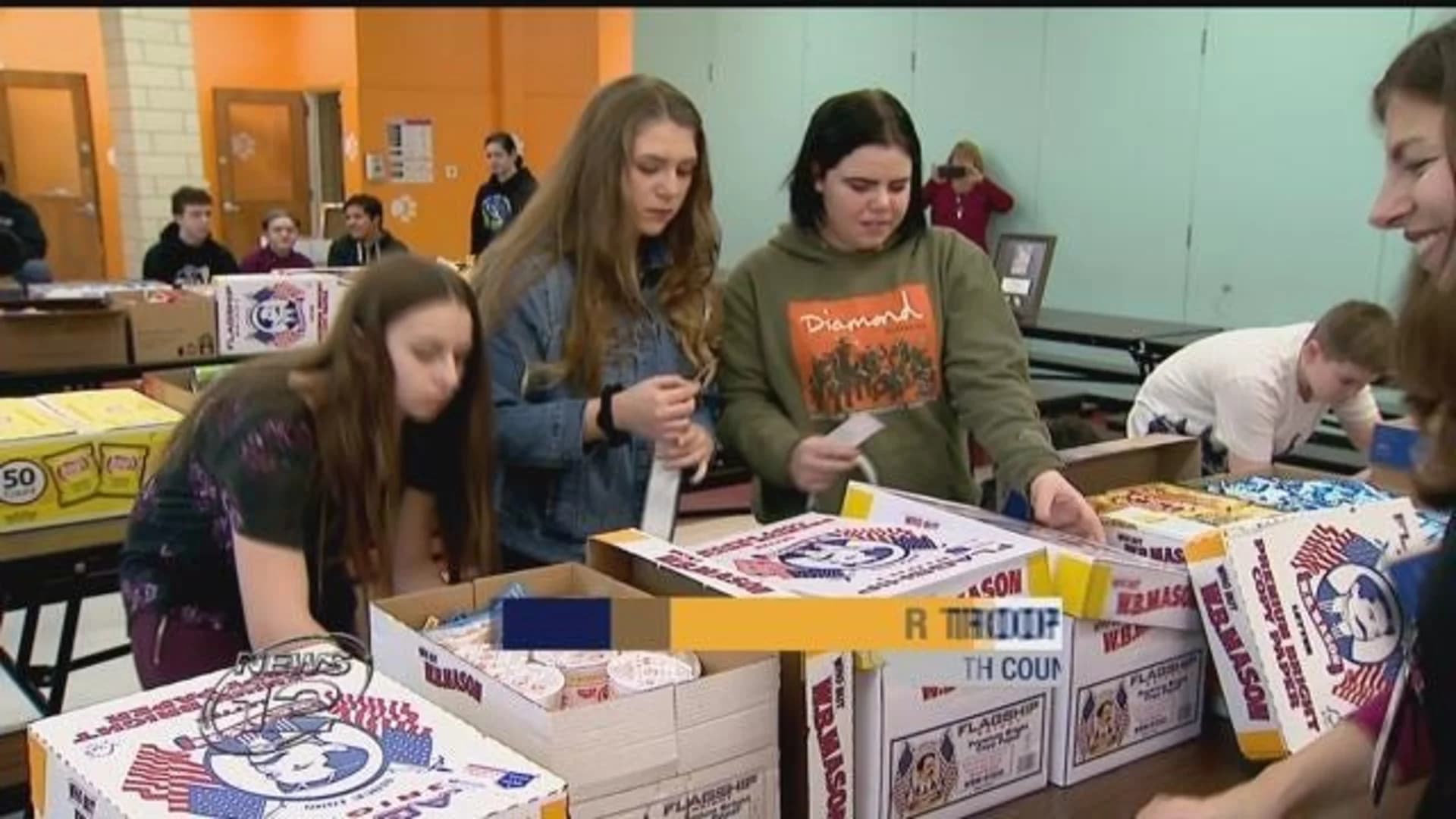 Students make care packages for troops to honor fallen soldier