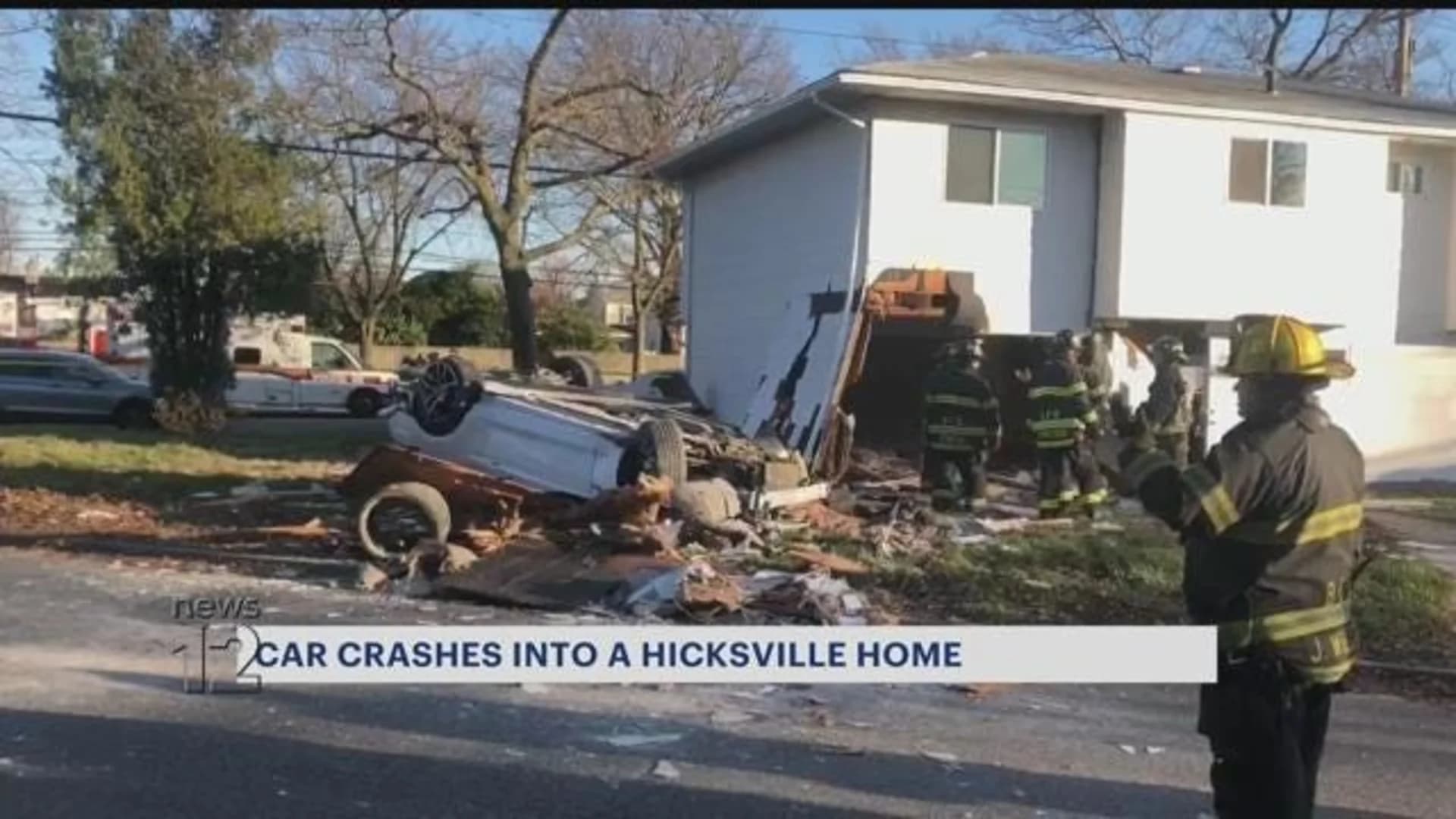 Car slams into Hicksville home