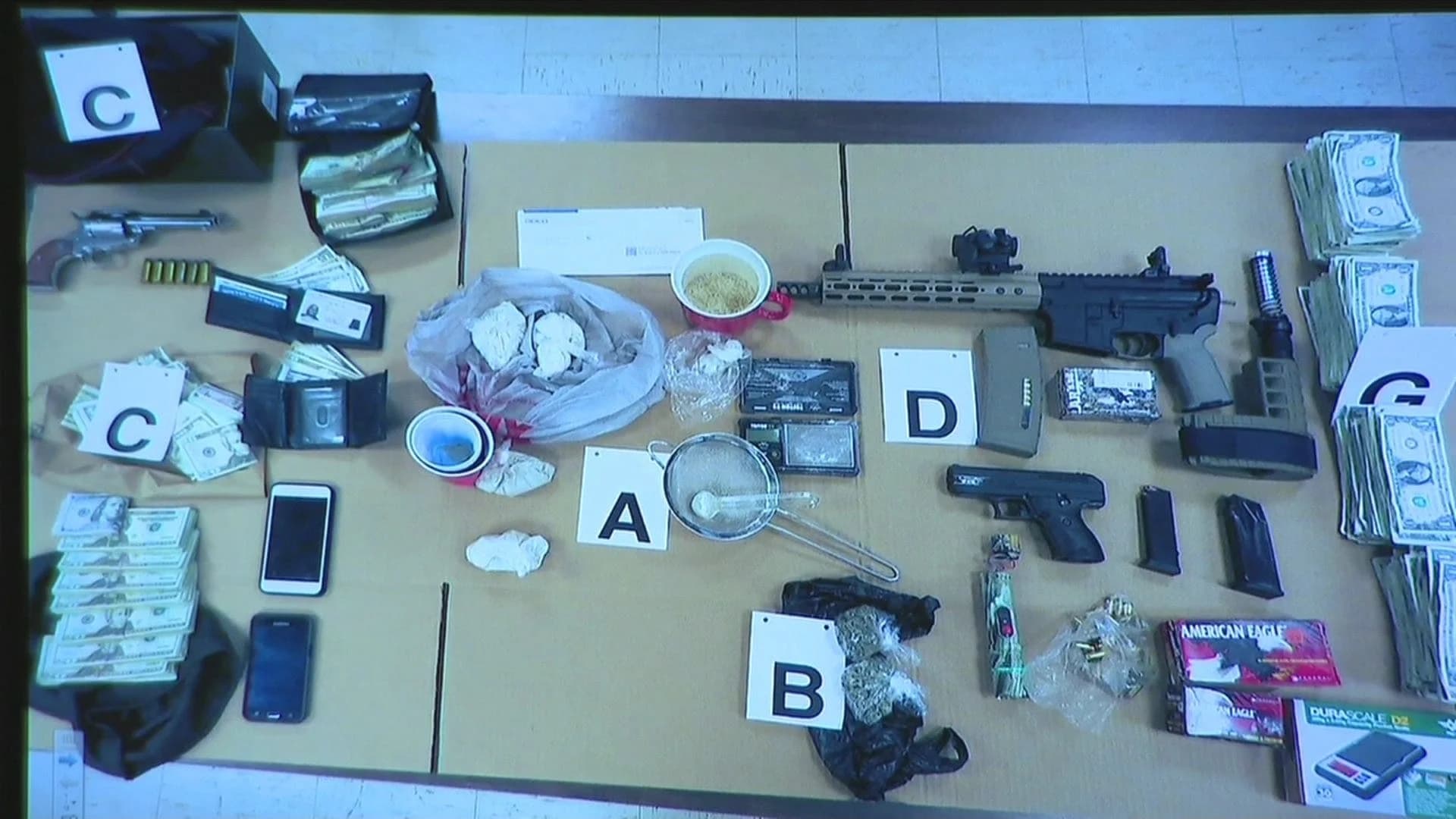 Police raid yields cache of drugs, cash, weapons in Coram