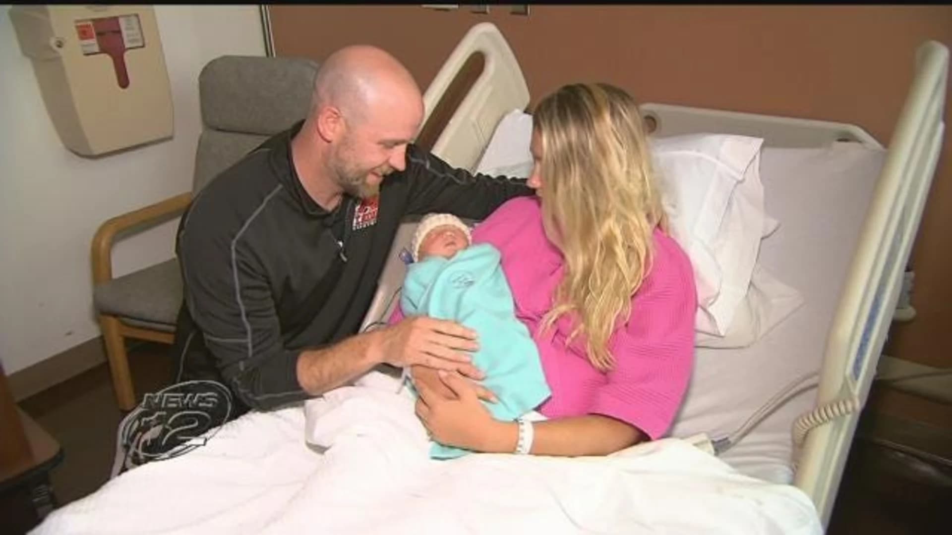 Mount Sinai man helps wife deliver baby inside kitchen