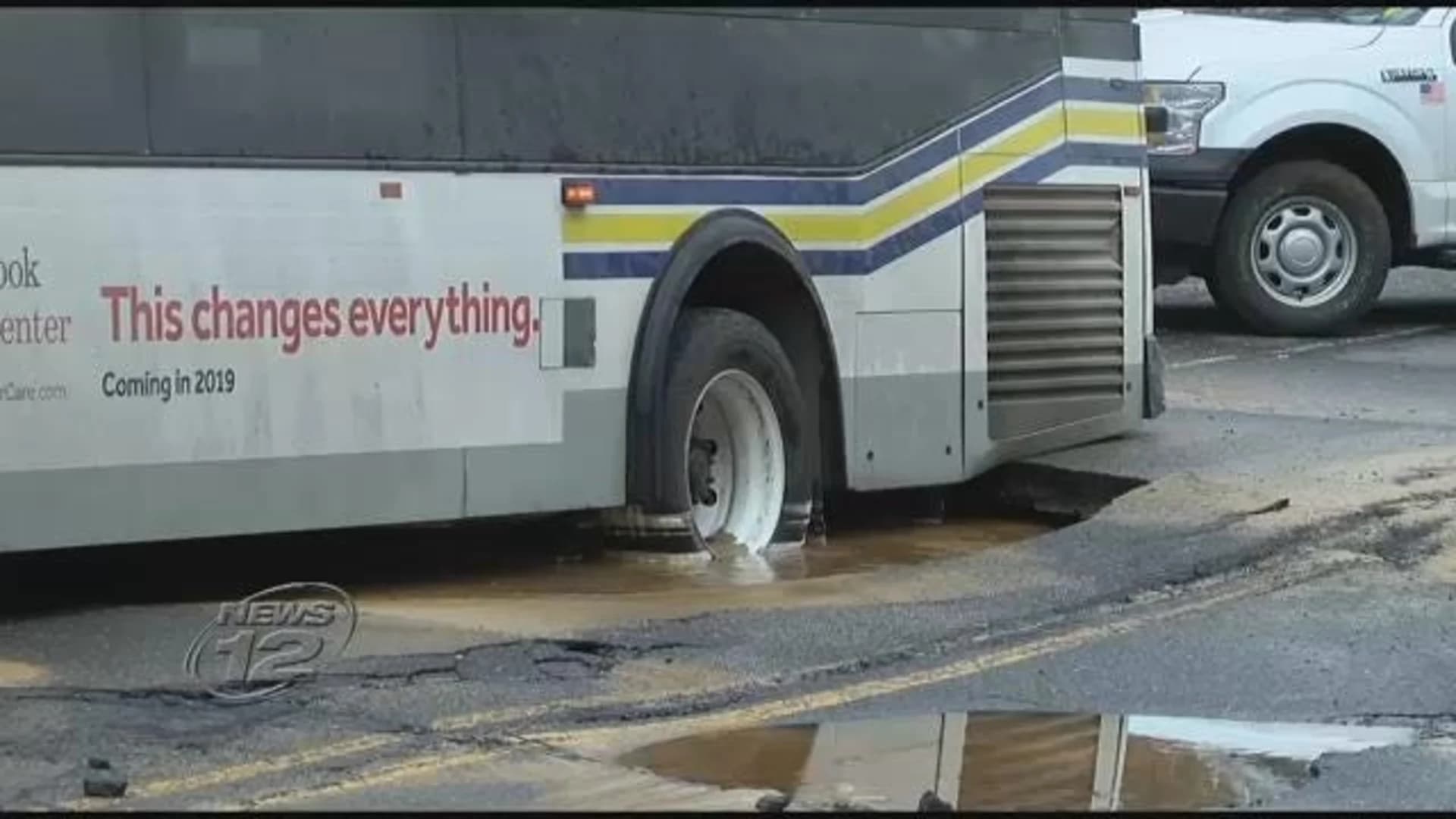 Suffolk Transit bus gets stuck in sinkhole