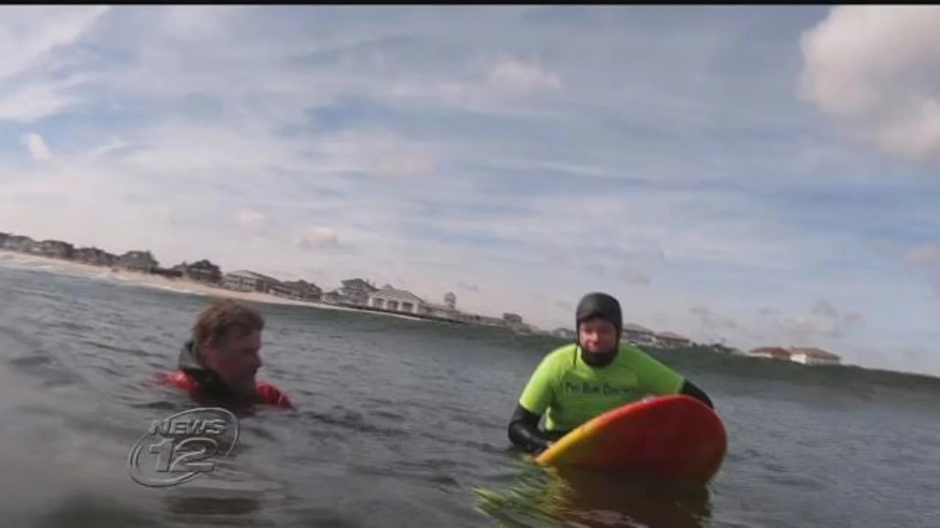 Surf’s up! NJ surf instructor gives winter lessons to adults