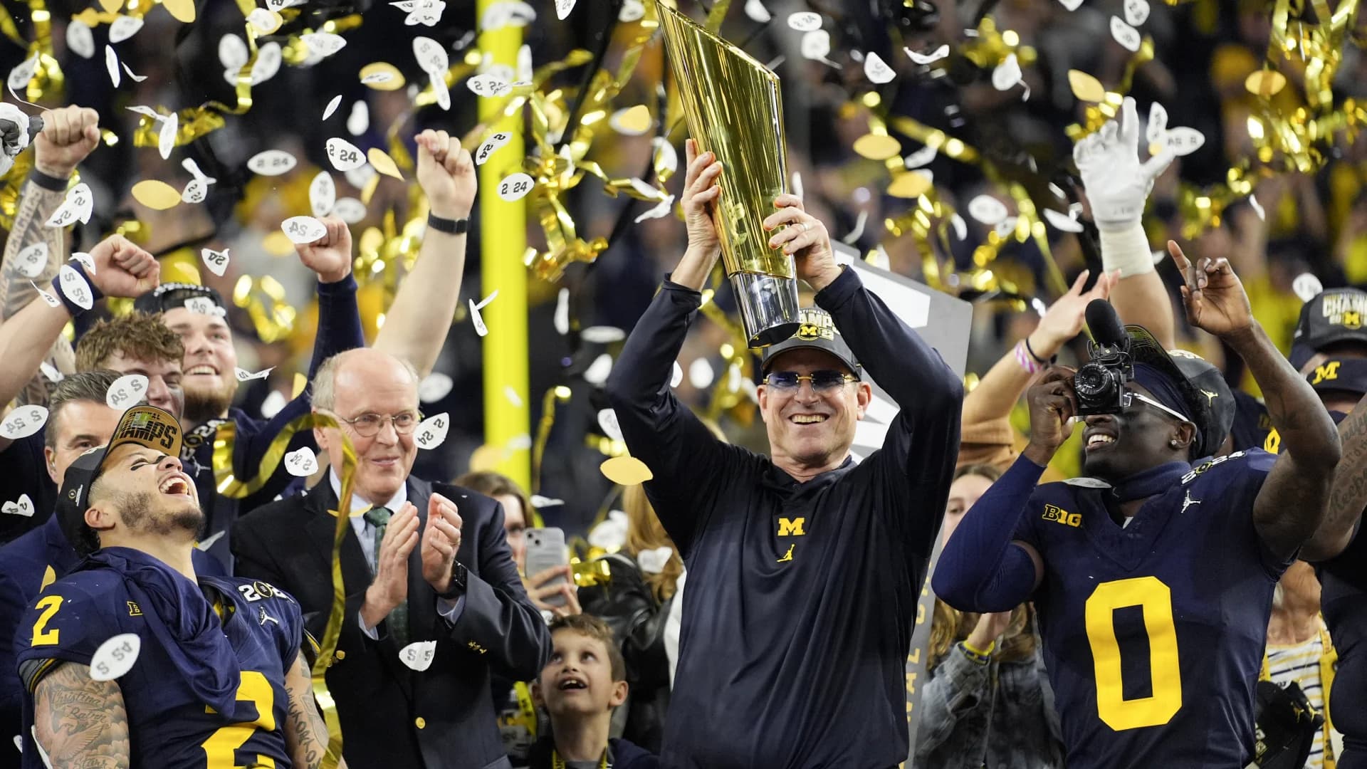 Michigan overpowers Washington 34-13 as Jim Harbaugh delivers a national title