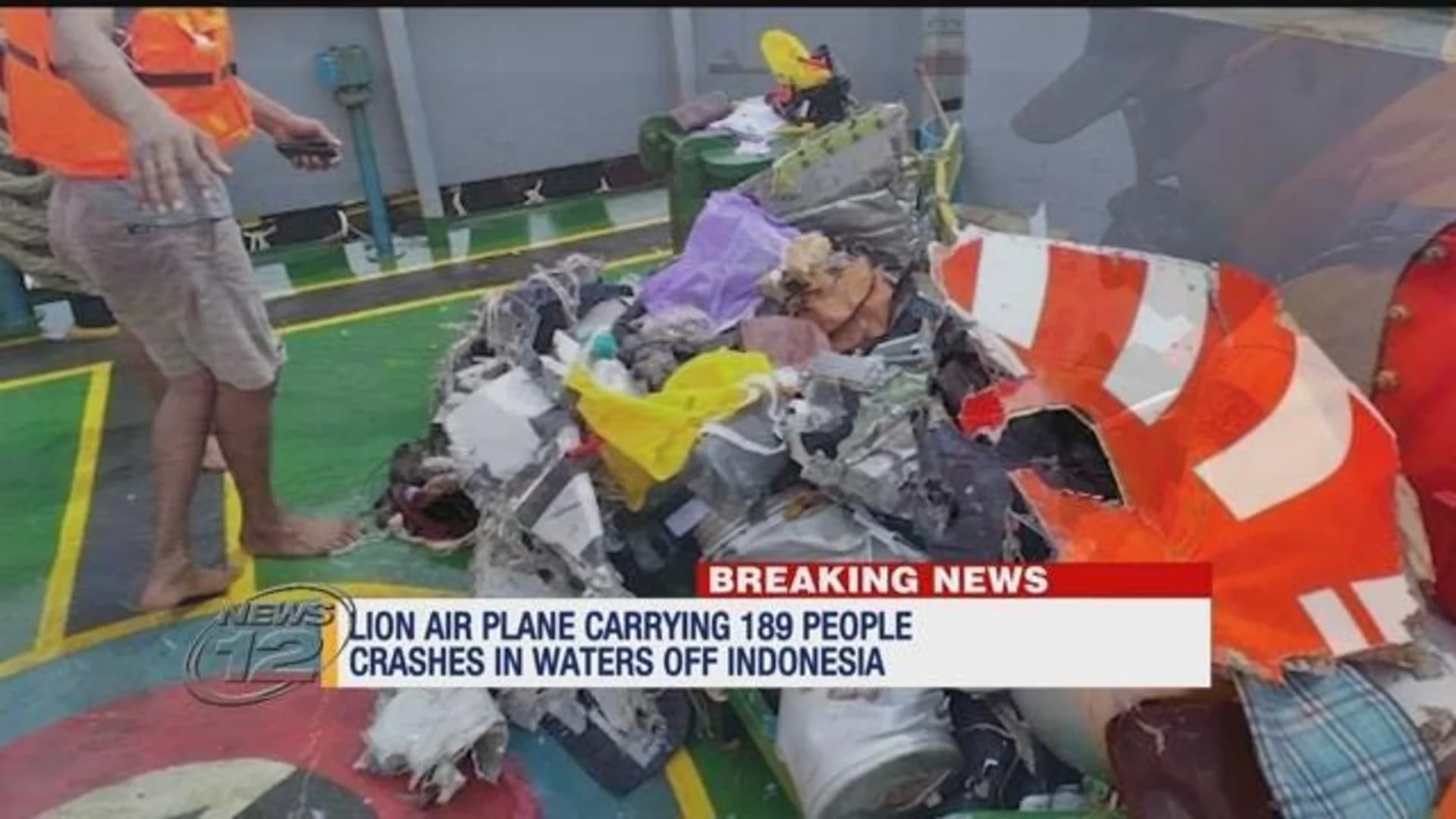 Indonesia plane crash search finds remains, debris at sea